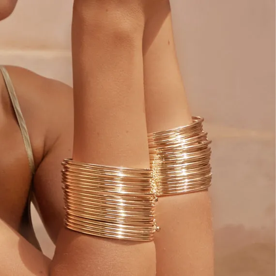 Rose Gold bangles with a Hematite bead(set of 10)